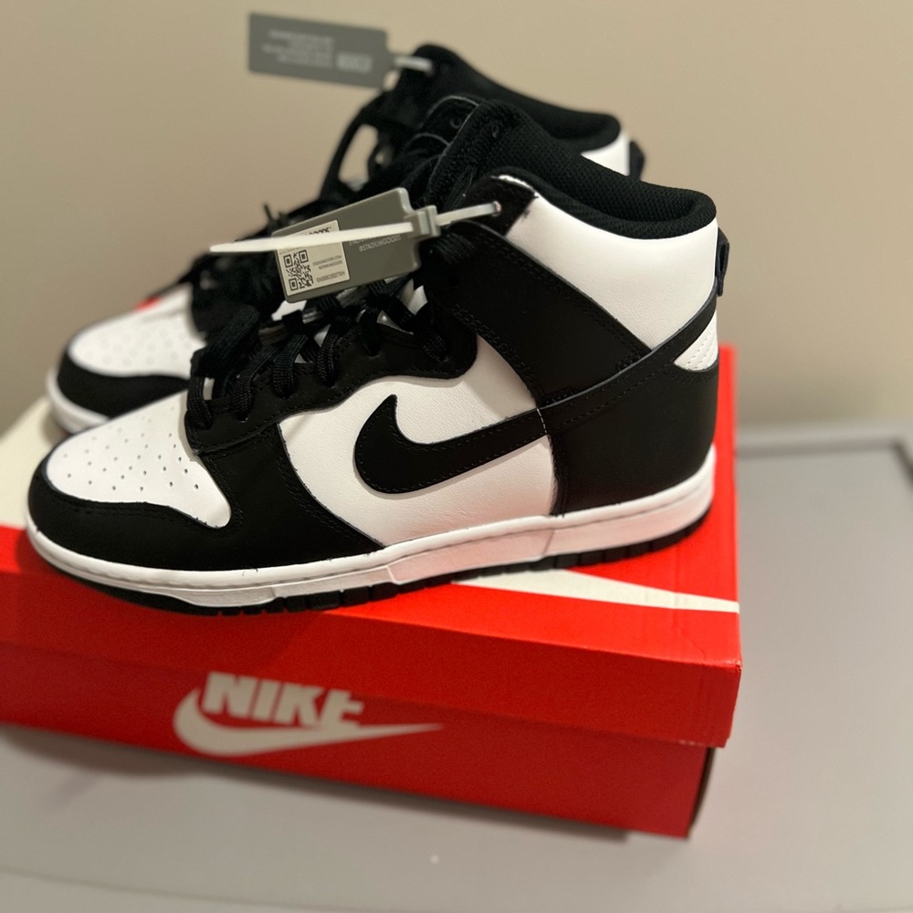 Women’s size 9 Nike Panda High Top Sneakers.
